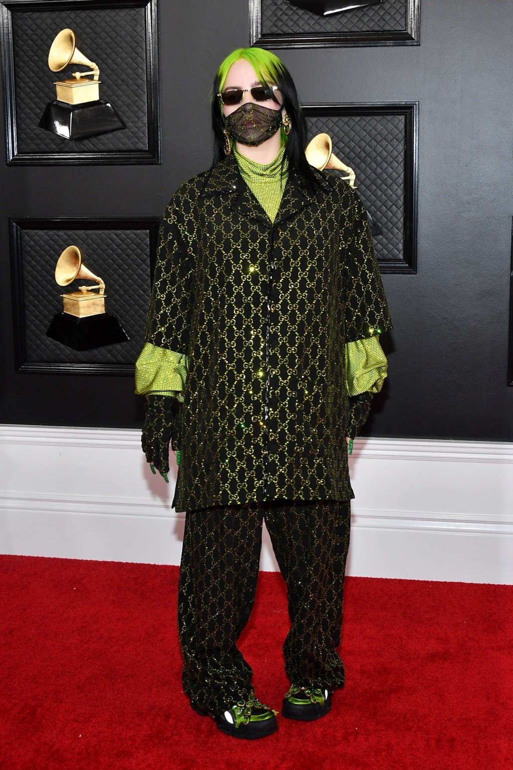 Billie Eilish turned up in head-to-toe Gucci on the pre-show red carpet at the Grammy Awards in Los Angeles. Photo: Agence France-Presse Billie Eilish turned up in head-to-toe Gucci on the pre-show red carpet at the Grammy Awards in Los Angeles. Photo: Agence France-Presse