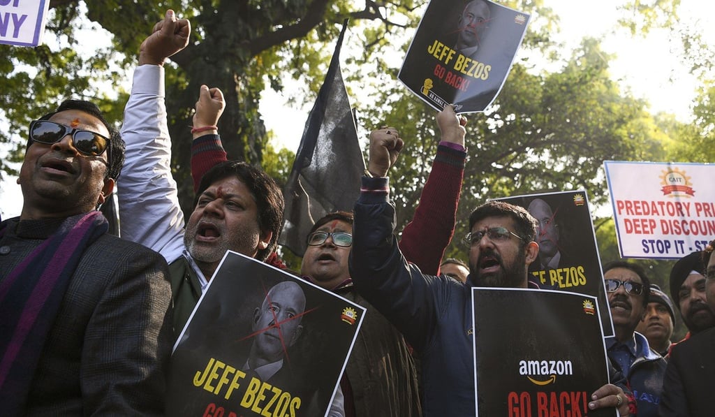 Traders staged a demonstration demanding the closure of online shopping platforms Amazon and Flipkart in New Delhi on January 15. Photo: AFP Traders staged a demonstration demanding the closure of online shopping platforms Amazon and Flipkart in New Delhi on January 15. Photo: AFP