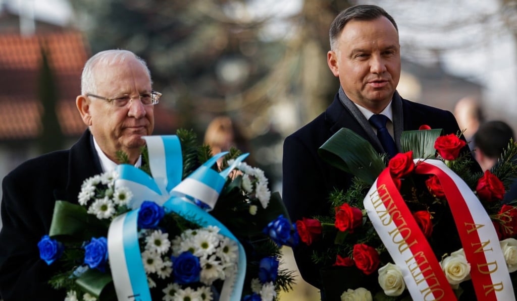 Poland's President Andrzej Duda and his Israeli counterpart Reuven Rivlin attend a wreath-laying ceremony marking the 75th anniversary of the liberation of Auschwitz. Photo: Reuters Poland's President Andrzej Duda and his Israeli counterpart Reuven Rivlin attend a wreath-laying ceremony marking the 75th anniversary of the liberation of Auschwitz. Photo: Reuters