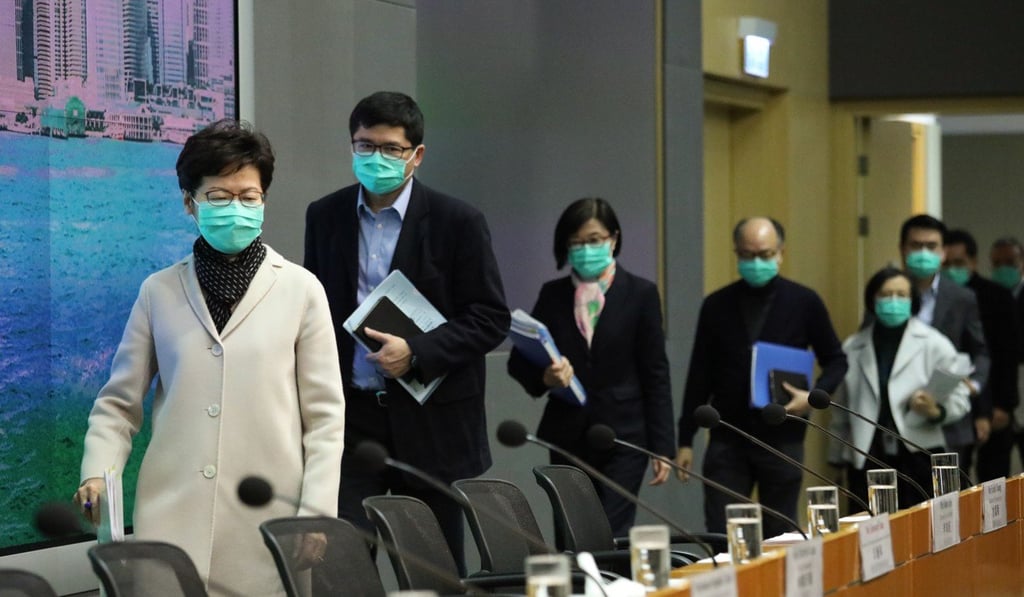 Carrie Lam arrives with a team of experts to address the media. Photo: Nora Tam