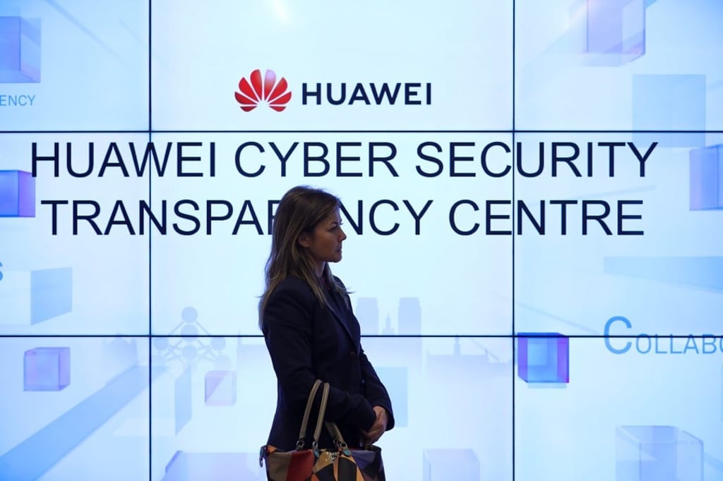 A woman listens to a debate at the Huawei Cyber Security Transparency Centre in Brussels, Belgium, on January 30, following the European Commission’s release of guidelines for 5G security agreed by the EU’s 28 member-states. Photo: Xinhua