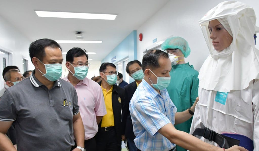 Thai health officials inspect protective clothing at Bamrasnaradura Infectious Disease Institute in Nonthaburi. Photo: AFP