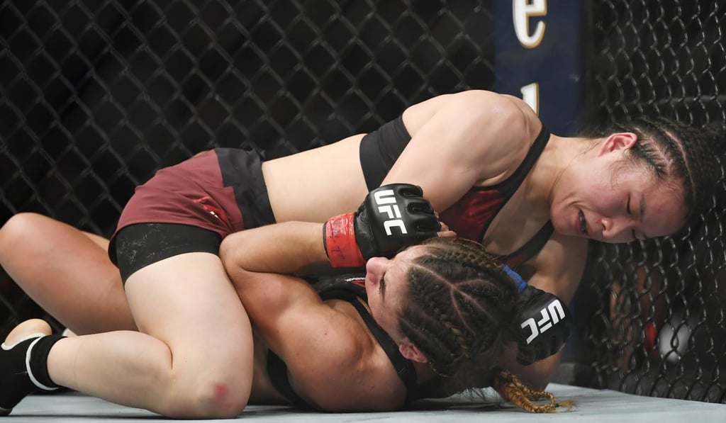 Zhang takes Tecia Torres to the ground at their UFC 235 bout in March 2019. Photo: USA Today