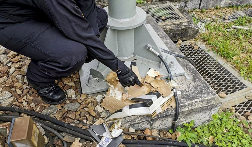 A suspicious item found on the side of the railway tracks at Tai Po Market MTR station turned out to be an empty shoebox wrapped in duct tape. Photo: Handout