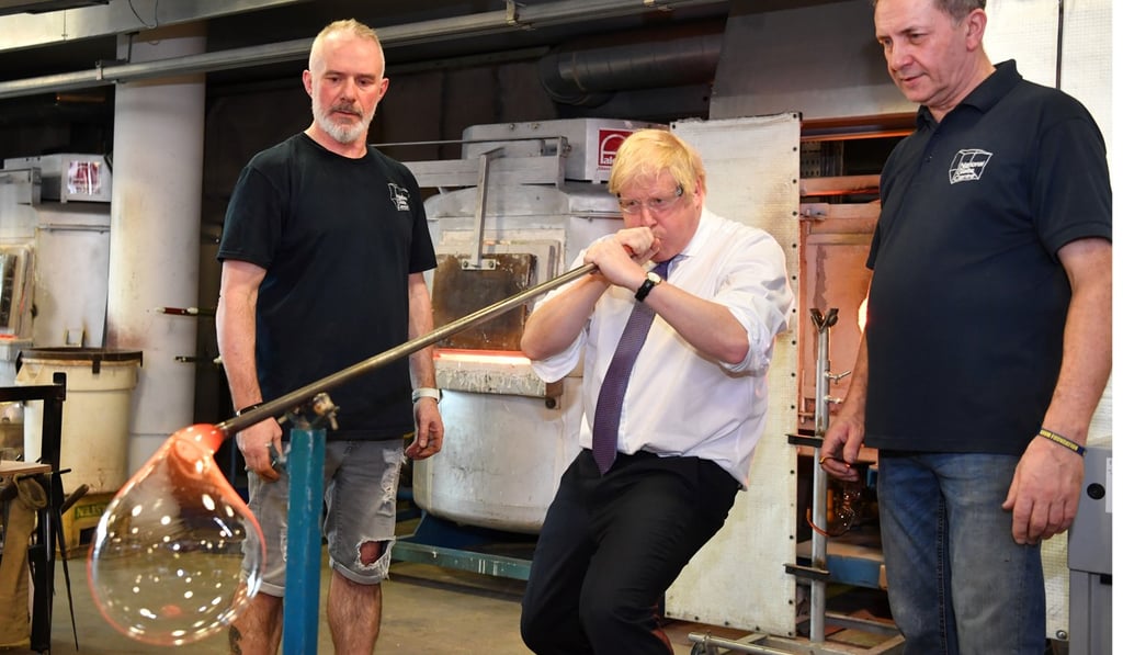 Prime Minister Boris Johnson makes glass. Photo: DPA Prime Minister Boris Johnson makes glass. Photo: DPA