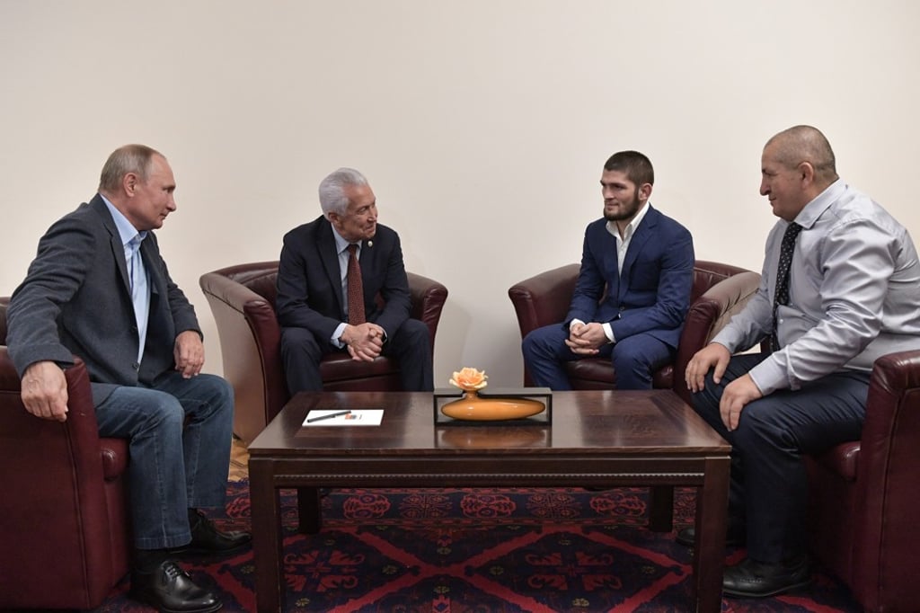 Russian President Vladimir Putin personally met UFC lightweight title holder Khabib Nurmagomedov and his father, coach Abdulmanap Nurmagomedov in Makhachkala, Russia, in September 2019. Photo: EPA-EFE