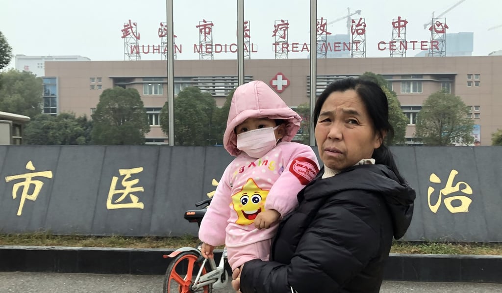 A women walks past Jinyintan Hospital, or Wuhan Medical Treatment Centre, in January. Photo: Simon Song