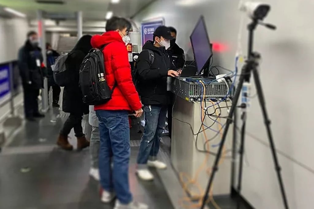 A team from artificial intelligence company Megvii sets up the firm’s advanced remote fever detection system at a railway station in Beijing, where the temperature measurements of all commuters are inspected. Photo: Handout