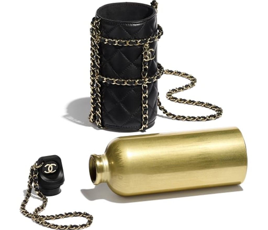A long gold chain gives Chanel’s new water bottle the look of a bag, and also makes it easy to carry over the shoulder. Photo: Chanel