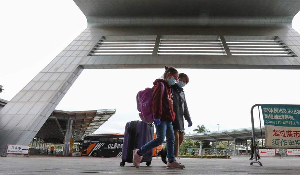 A trickle of passengers pass through the Shenzhen Bay Port from Hong Kong to mainland China. Photo: Felix Wong
