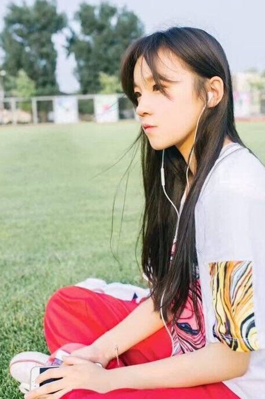 A younger Yuqi before her debut. A younger Yuqi before her debut.