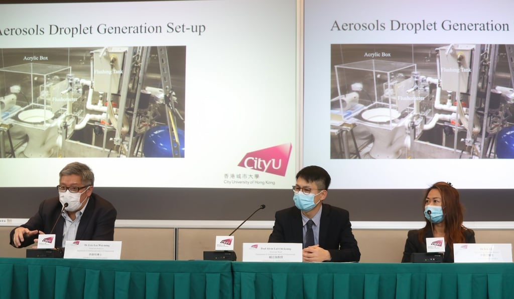 Dr Eric Lee (left) and Professor Alvin Lai of City University and infectious disease expert Dr Iris Li explain the distribution of airborne aerosol droplets emitted from toilet flushing on February 13. Photo: K.Y. Cheng