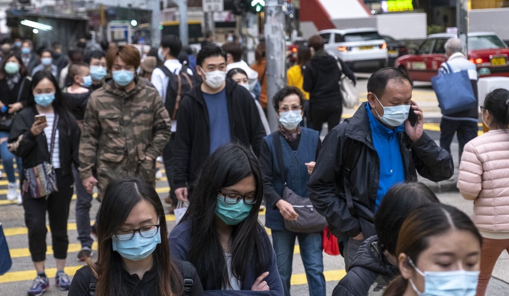 Pedestrians, mostly with surgical masks, in Mong Kok. Photo: Sun Yeung