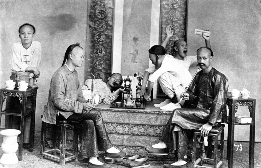 Opium smokers joke around and pose in their “den” in Shanghai, in 1898. Photo: Getty Images Opium smokers joke around and pose in their “den” in Shanghai, in 1898. Photo: Getty Images
