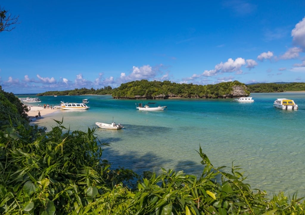 Boats with glass bottoms float in a beautiful tropical lagoon in Ishigaki, Japan. Photo: Corbis via Getty Images Boats with glass bottoms float in a beautiful tropical lagoon in Ishigaki, Japan. Photo: Corbis via Getty Images