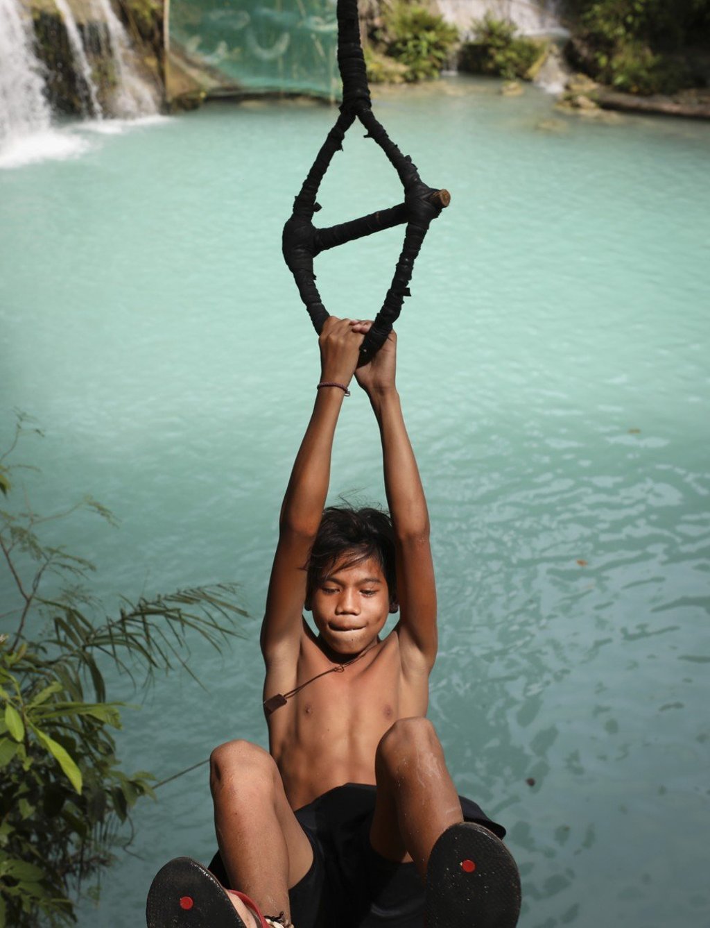 The Cambugahay waterfalls and swimming hole in Siquijor, Central Visayas, Philippines. Photo: James Wendlinger