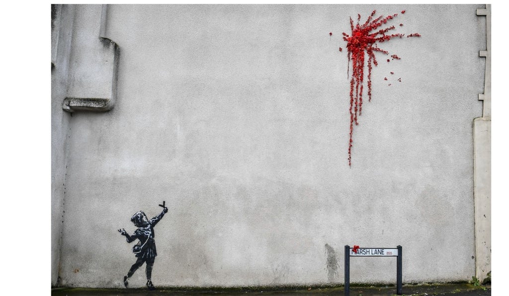 The artwork before it was vandalised. Photo: PA via AP The artwork before it was vandalised. Photo: PA via AP