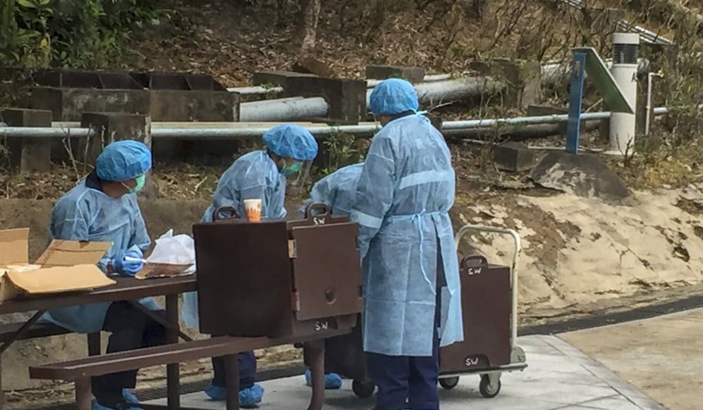 Staff at Lady MacLehose Holiday Village deliver meals to people under quarantine. Photo: Handout