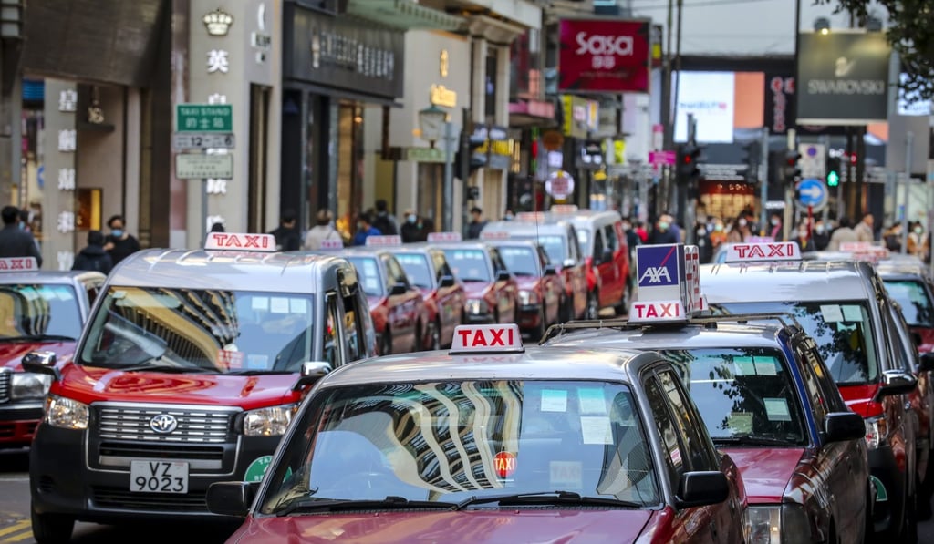 Taxis queue for passengers on Russell Street in Causeway Bay. The sector has been slammed in recent weeks as Hongkongers have largely kept indoors amid fears of the coronavirus outbreak. Photo: Winson Wong