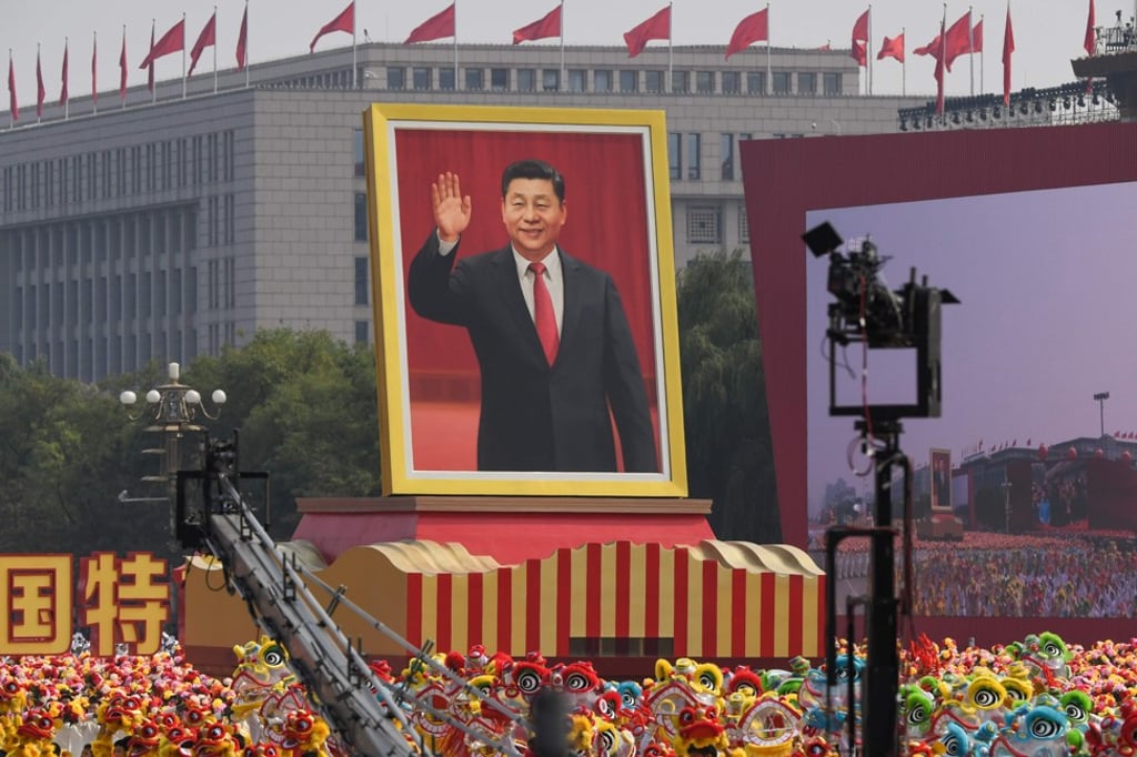 A float with a giant portrait of Chinese President Xi at the National Day parade in Tiananmen Square, Beijing, China. Photo: AFP