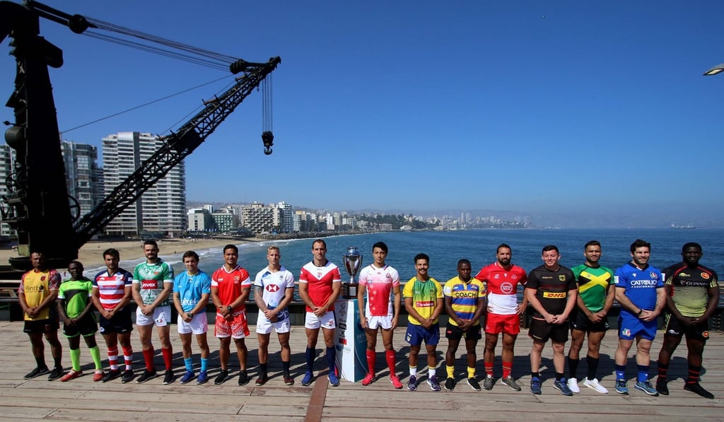 Max Woodward, seventh from left, along with the other 15 captains in Chile. Photo: World Rugby Max Woodward, seventh from left, along with the other 15 captains in Chile. Photo: World Rugby