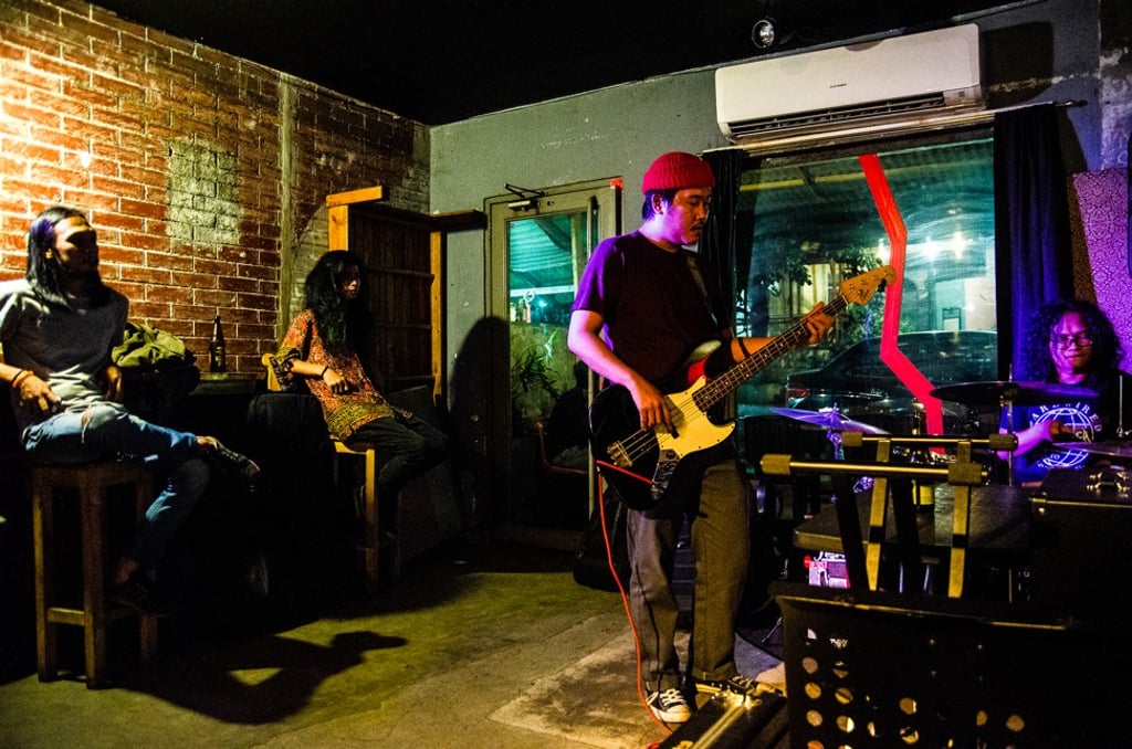 A band plays at open mic night at Catch 272 bar in Manila. Photo: Maro Enriquez