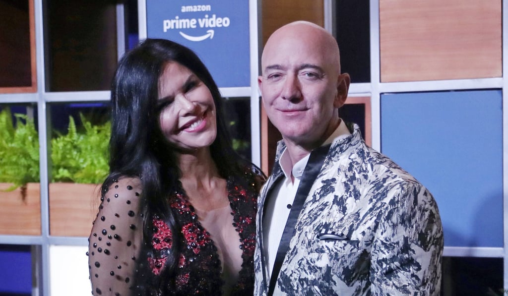 Amazon CEO Jeff Bezos (at right) and his girlfriend Lauren Sanchez pose during an event organized by Amazon Prime Video in Mumbai, India in January. Photo: AP Amazon CEO Jeff Bezos (at right) and his girlfriend Lauren Sanchez pose during an event organized by Amazon Prime Video in Mumbai, India in January. Photo: AP