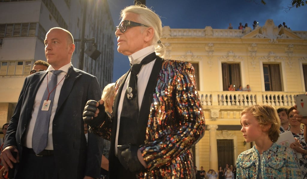 Lagerfeld with his godson Hudson Kroenig in Havana in May 2016. Photo: AFP