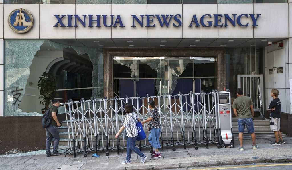 The Xinhua News Agency building in Wan Chai in Hong Kong, which was damaged during protests in November. Photo: SCMP/Winson Wong