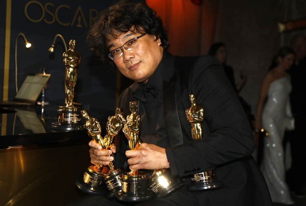 Bong poses with the Oscars he won for Parasite at the Governors Ball following the 92nd Academy Awards in Los Angeles. Photo: Reuters Bong poses with the Oscars he won for Parasite at the Governors Ball following the 92nd Academy Awards in Los Angeles. Photo: Reuters