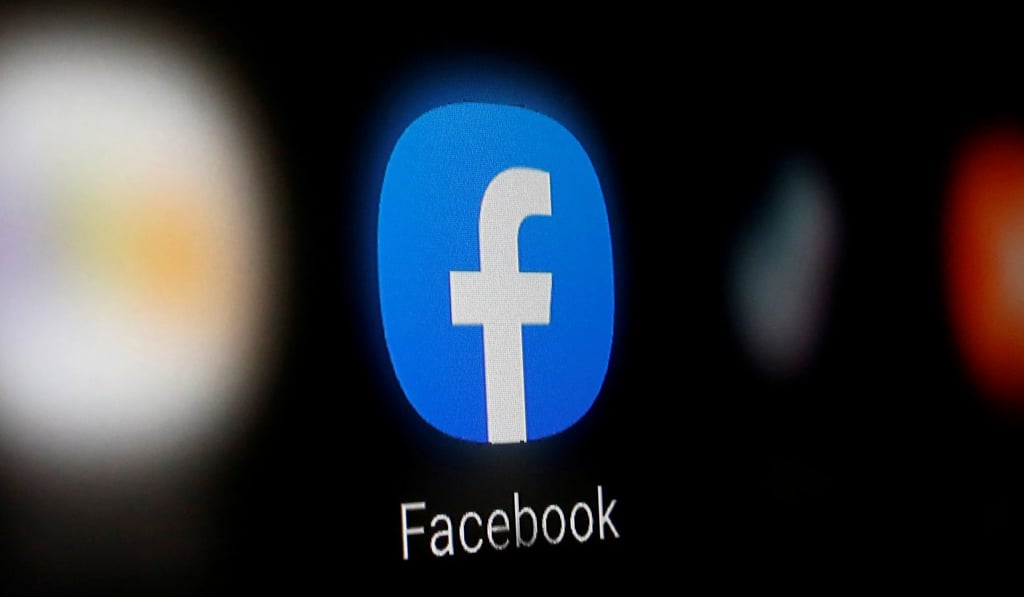 A Facebook logo is displayed on a smartphone. Photo: Reuters A Facebook logo is displayed on a smartphone. Photo: Reuters