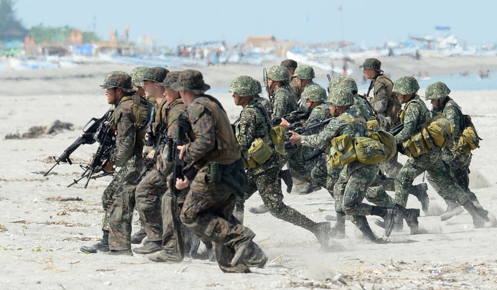 Philippine and US Marines take part in a beach assault exercise in 2014. Photo: AFP Philippine and US Marines take part in a beach assault exercise in 2014. Photo: AFP