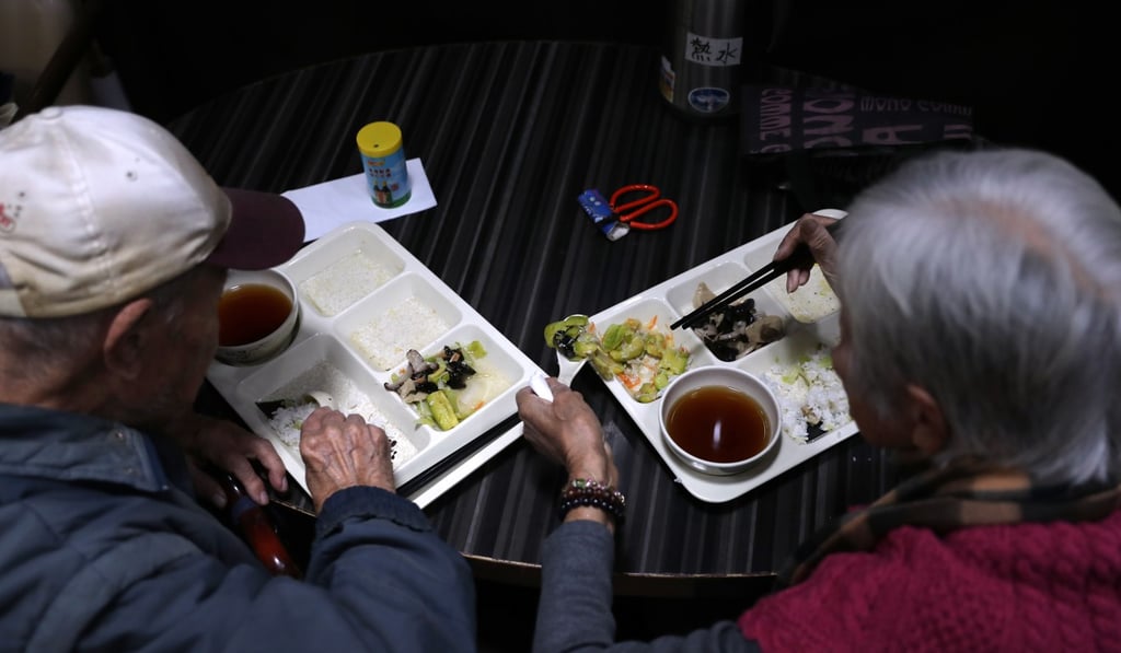 An elderly couple eat at Grateful Free Vegetarian Restaurant, a non-profit eatery in To Kwa Wan which offered free meals daily except on Sundays, in December 2018. Photo: Winson Wong