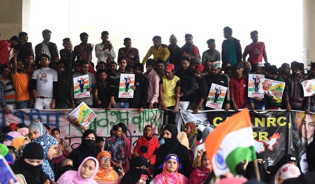 Demonstrators at a protest against the Indian government's Citizenship Amendment Act (CAA) and the National Register of Citizens (NRC) at Jaffrabad area in New Delhi. Photo: AFP Demonstrators at a protest against the Indian government's Citizenship Amendment Act (CAA) and the National Register of Citizens (NRC) at Jaffrabad area in New Delhi. Photo: AFP