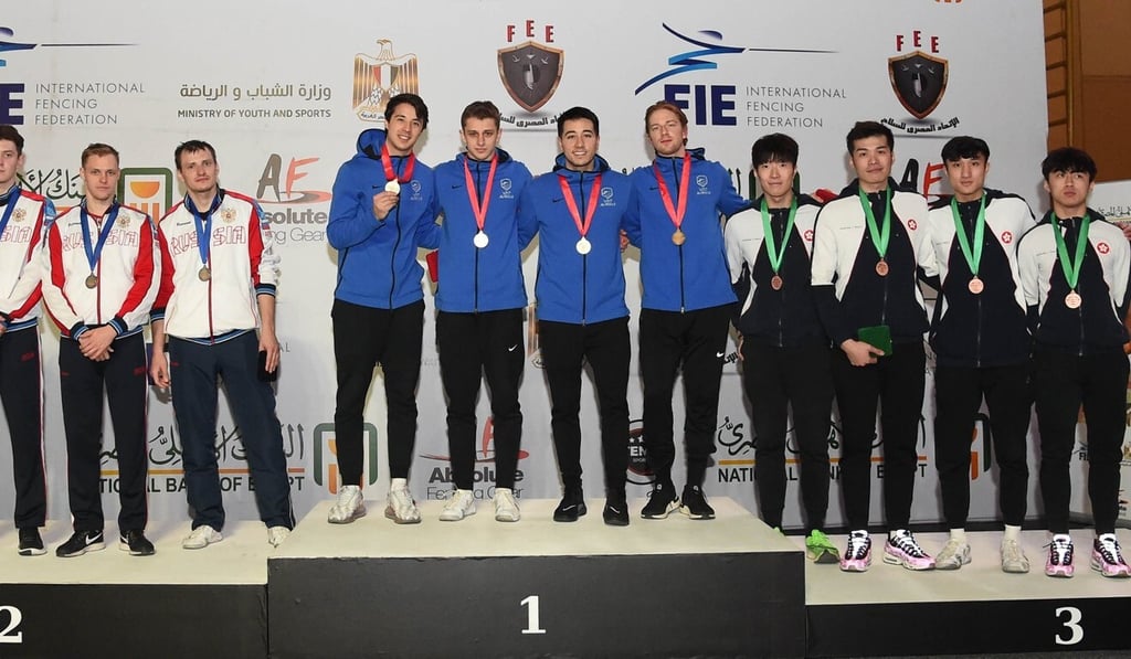 Hong Kong team at the medal ceremony in Cairo. Photo: FIE Hong Kong team at the medal ceremony in Cairo. Photo: FIE