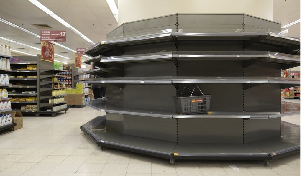 Empty shelves in a supermarket in Hong Kong. Photo: Justin Chin/Bloomberg