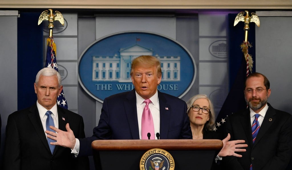 US President Donald Trump, flanked by Health and Human Services Secretary Alex Azar, US Vice-President Mike Pence (L) and CDC Principal Deputy Director Anne Schuchat, holds a news conference with members of the Centers for Disease Control and Prevention(CDC) on the COVID-19 outbreak at the White House on Wednesday. Photo: AFP US President Donald Trump, flanked by Health and Human Services Secretary Alex Azar, US Vice-President Mike Pence (L) and CDC Principal Deputy Director Anne Schuchat, holds a news conference with members of the Centers for Disease Control and Prevention(CDC) on the COVID-19 outbreak at the White House on Wednesday. Photo: AFP