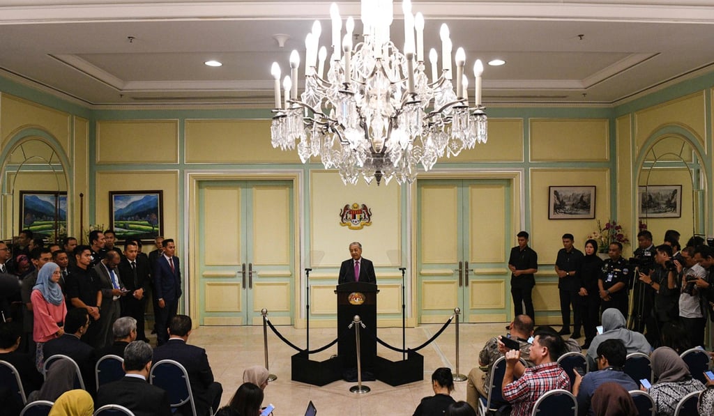 Malaysia's interim Prime Minister Mahathir Mohamad speaks to the media in Putrajaya. Photo: AFP Malaysia's interim Prime Minister Mahathir Mohamad speaks to the media in Putrajaya. Photo: AFP