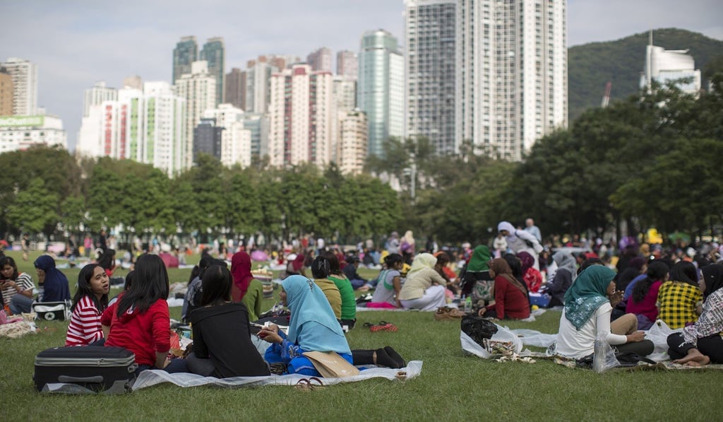 Migrant workers picnic in Victoria Park in Hong Kong. Photo: Bloomberg
