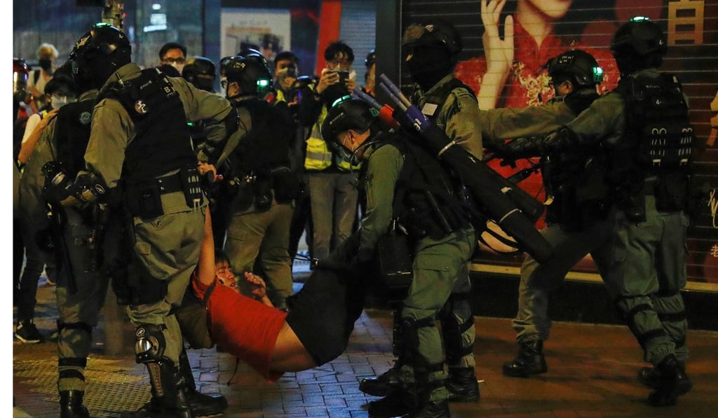 Riot police detain an anti-government protester during a protest at Mong Kok in Hong Kong on March 1. Photo: Reuters