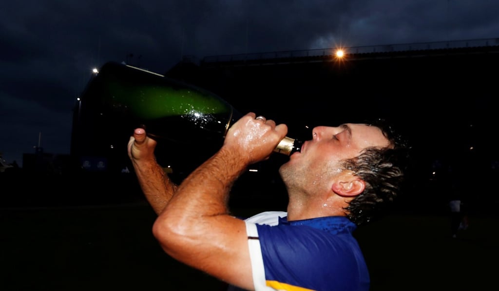 Team Europe's Francesco Molinari drinks champagne as they celebrate after winning the 2018 Ryder Cup. Photo: Reuters