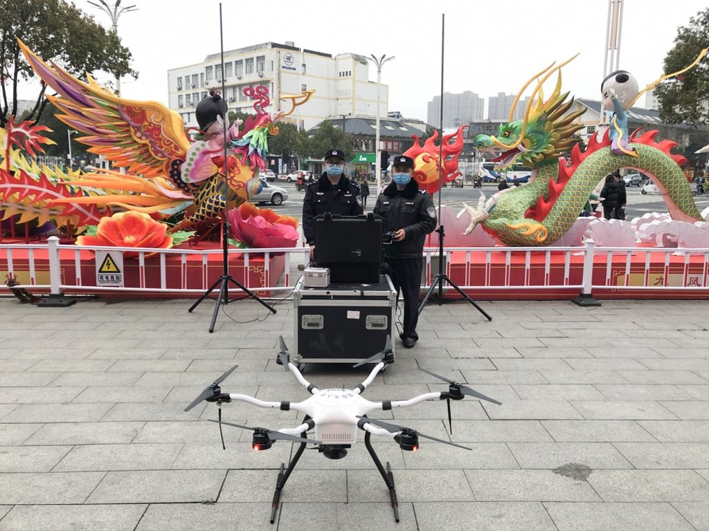 Police in Suqian of Jiangsu province using drones made by Shenzhen Smart Drone UAV to disperse crowds and broadcast public health updates. Photo: Handout Police in Suqian of Jiangsu province using drones made by Shenzhen Smart Drone UAV to disperse crowds and broadcast public health updates. Photo: Handout