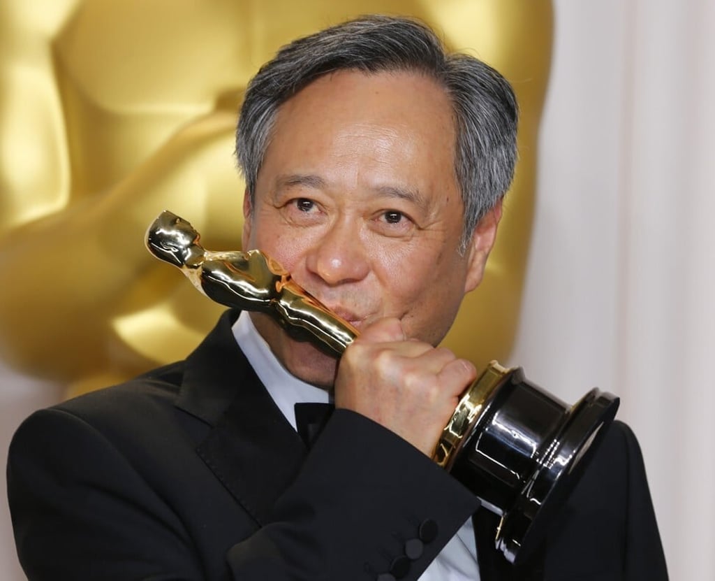 Lee kisses his Oscar for best director for Life of Pi at the Academy Awards in Hollywood, California in 2013. Photo: Reuters