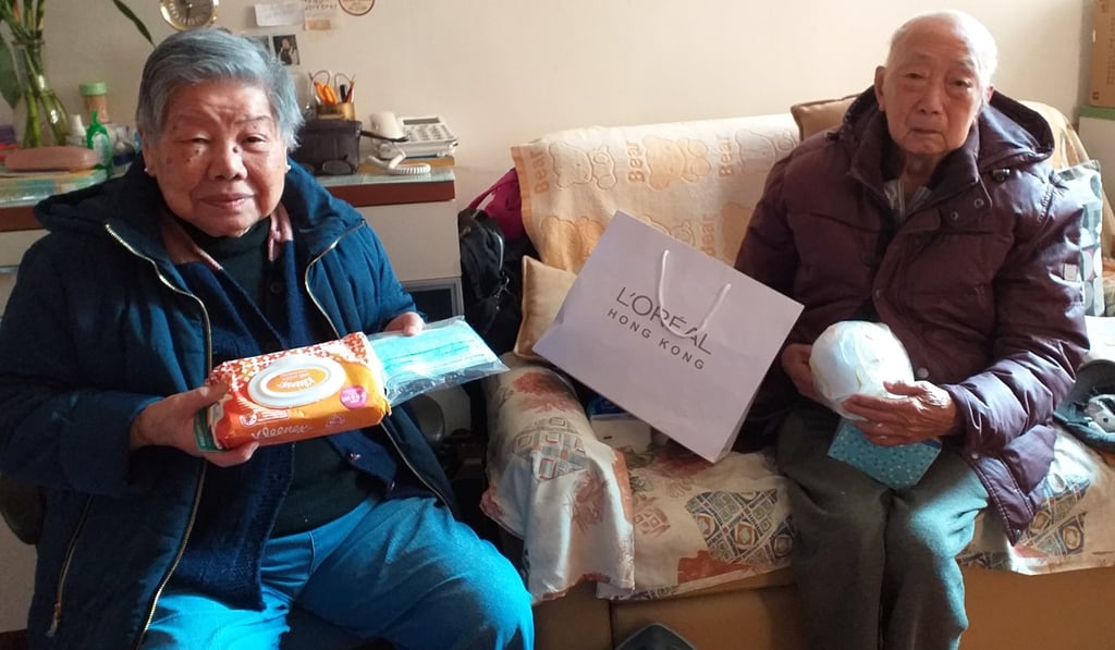 Elderly residents receive donated emergency relief items as part of a citywide collection and distribution effort coordinated by HandsOn Hong Kong. Photo: HandsOn Hong Kong Elderly residents receive donated emergency relief items as part of a citywide collection and distribution effort coordinated by HandsOn Hong Kong. Photo: HandsOn Hong Kong