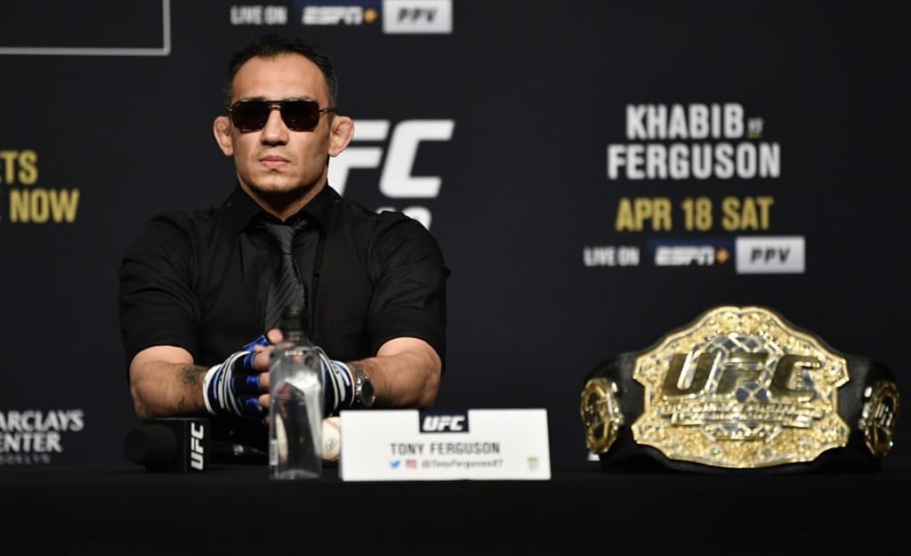 Tony Ferguson looks on during the UFC 249 press conference with gloves on and a baseball. Photo: Jeff Bottari/Zuffa LLC