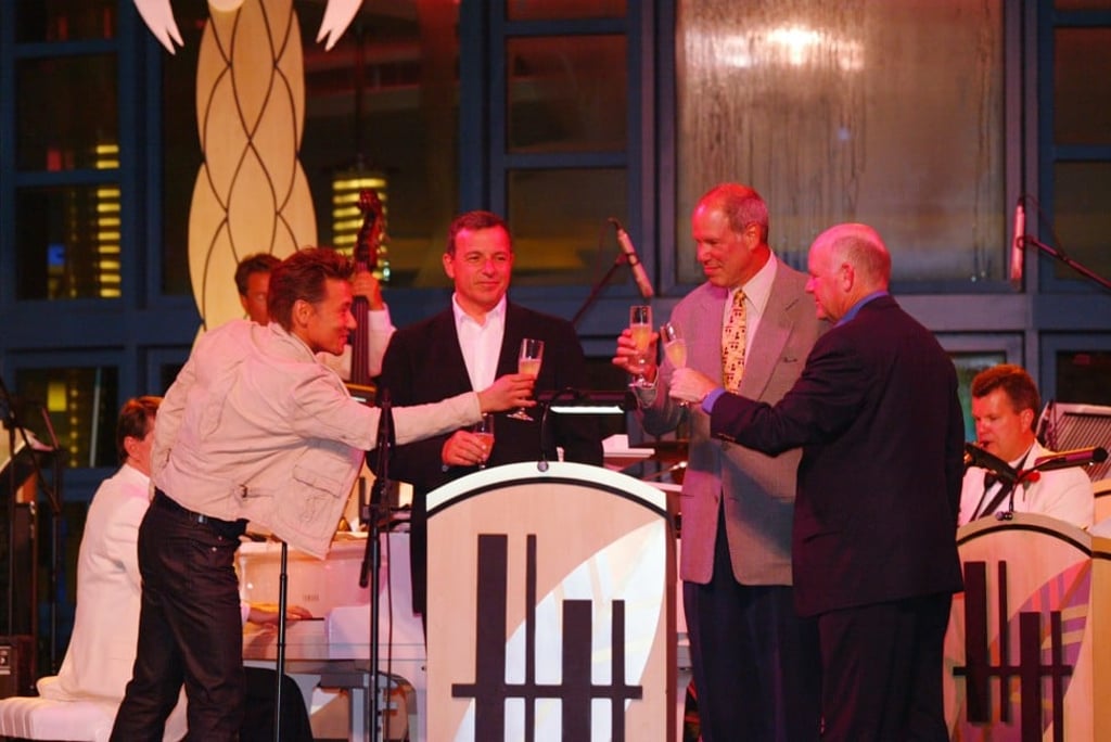 (From left) Singer Jacky Cheung, Disney’s chief operating officer Bob Iger, Disney’s CEO Michael Eisner and Group managing director of Hong Kong Disneyland Hotel Don Robinson at the opening of Hong Kong Disneyland’s Hollywood Hotel in September 2005. Photo: Handout