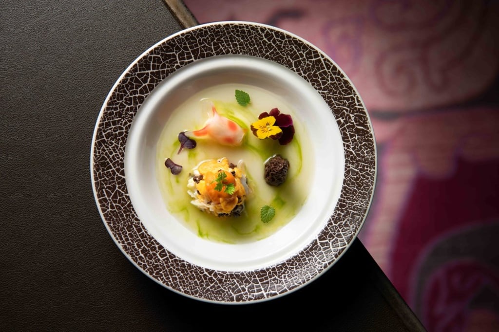 Steamed and sautéed egg with crabmeat, sea urchin and mini goldfish dumpling.
