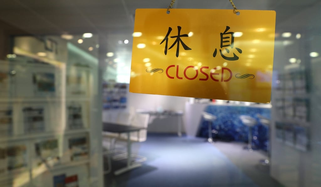 A travel agency sits closed in Sha Tin amid a massive tourism downturn driven by the global coronavirus epidemic. Photo: Winson Wong