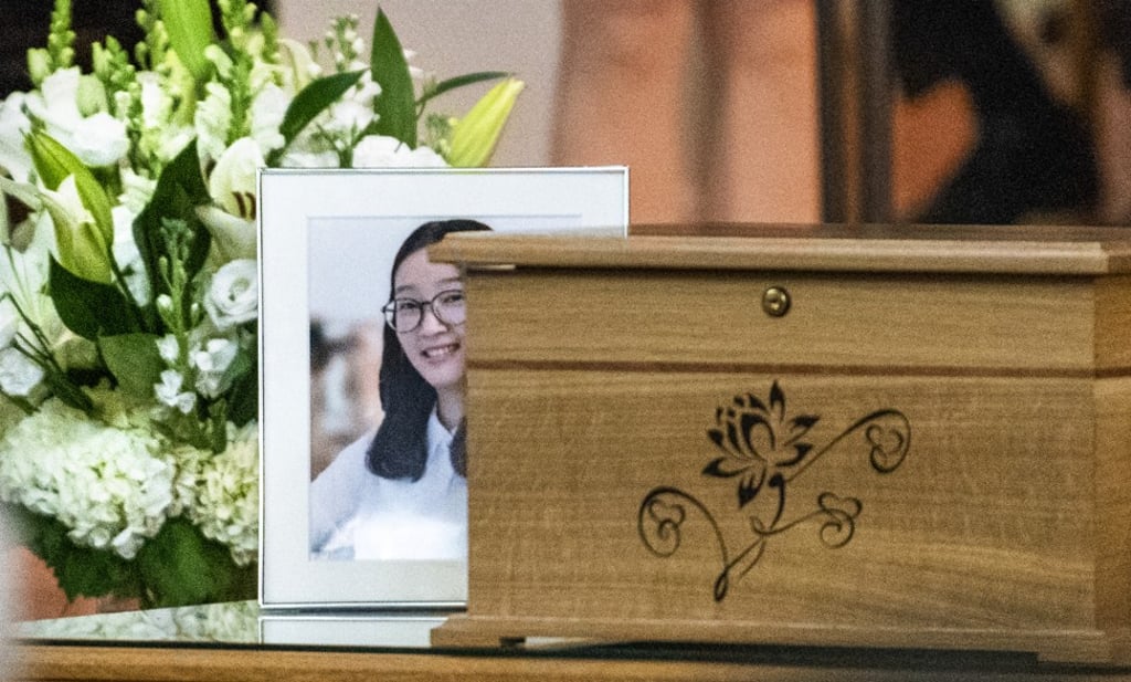A framed photograph of Zhang and a box containing some of her possessions on display at a memorial service for the murdered Chinese student held at the First Baptist Church in Savoy, Illinois. Photo: AP