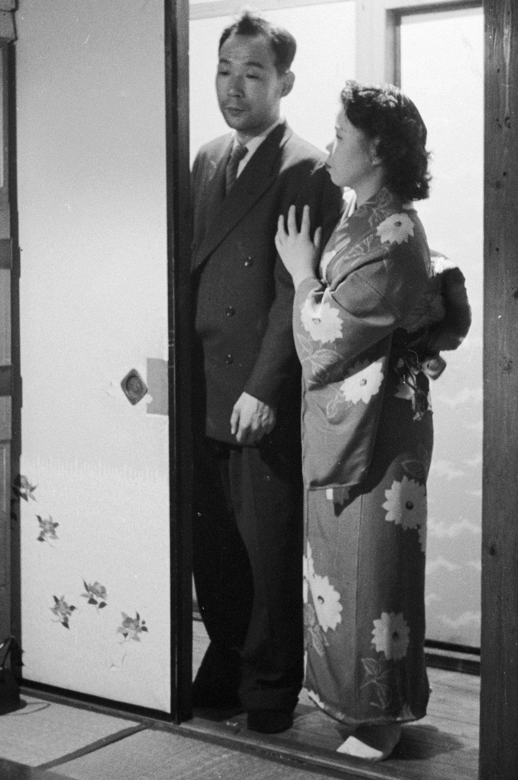 A Japanese prostitute from Yoshiwara, the red light district of Tokyo in the 1960s, shows her client into a private bedroom. Photo: Getty Images A Japanese prostitute from Yoshiwara, the red light district of Tokyo in the 1960s, shows her client into a private bedroom. Photo: Getty Images